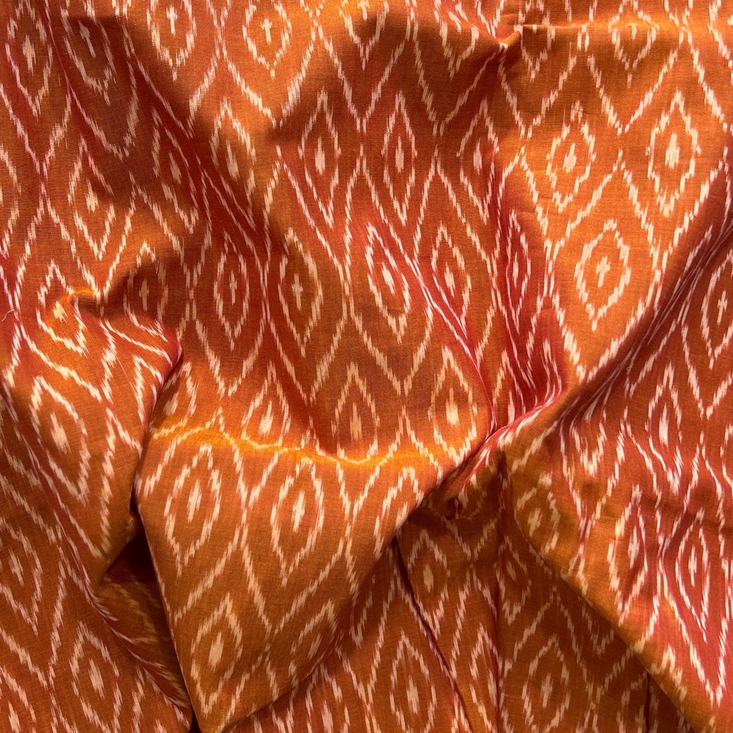 Cotton Mercerised Ikkat Orange With White Woven Fabric
