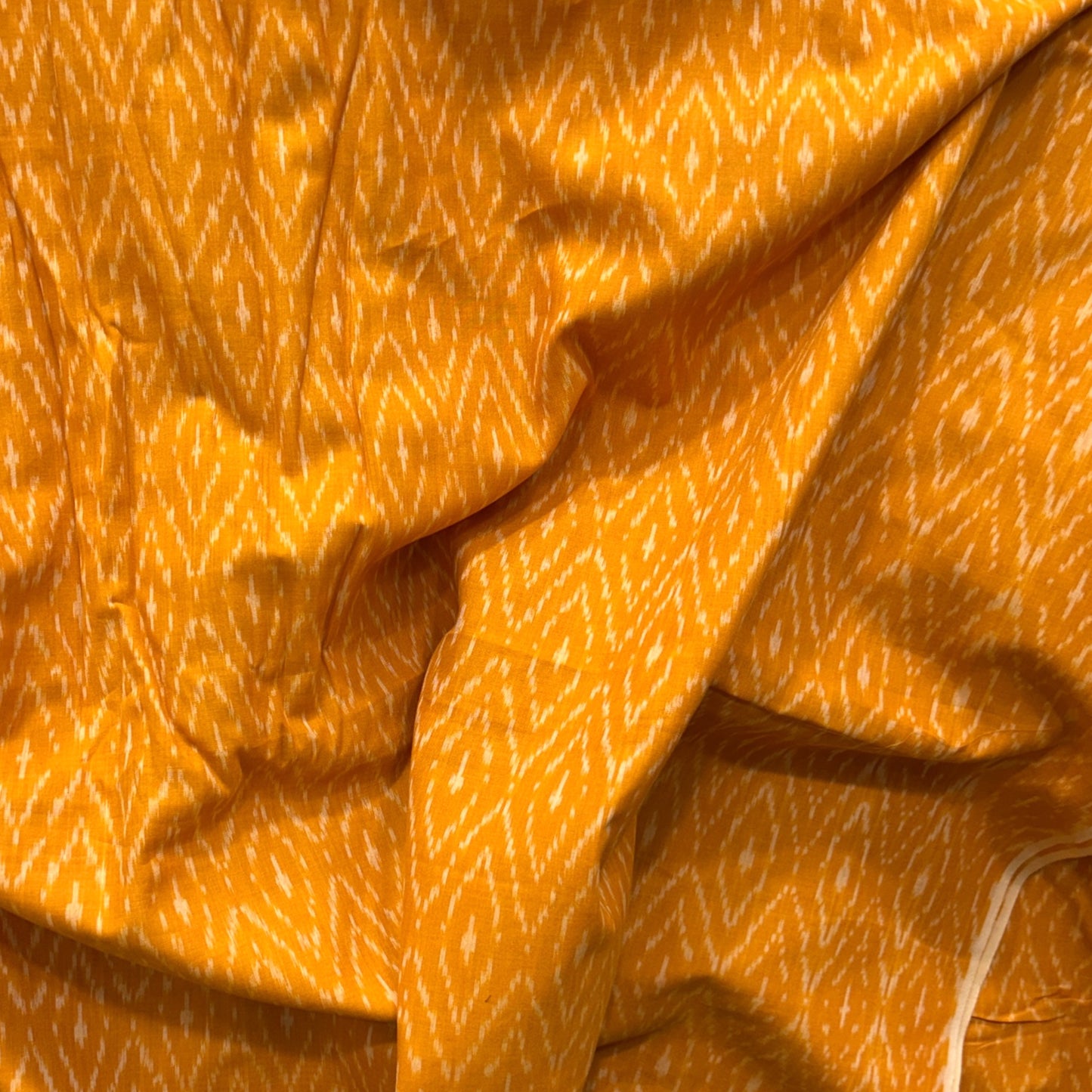 Cotton Mercerised Ikkat Yellow With White Woven Fabric